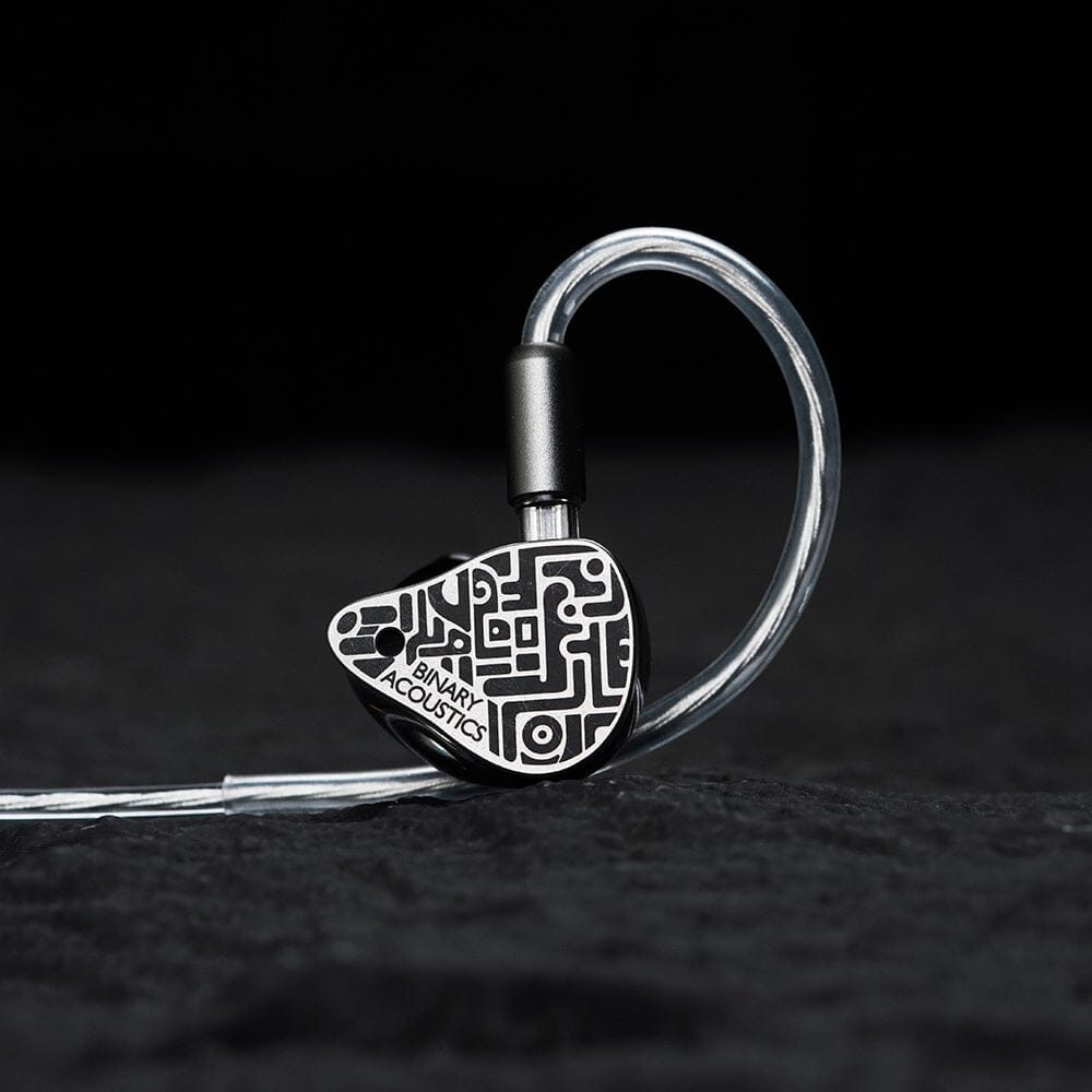 Single earpiece with the silver-plated cable, faceplate side. Photo: Binary Acoustics / HiFiGo.