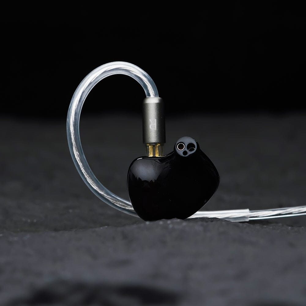 Single earpiece from the nozzle side, three bores visible. Photo: Binary Acoustics / HiFiGo.