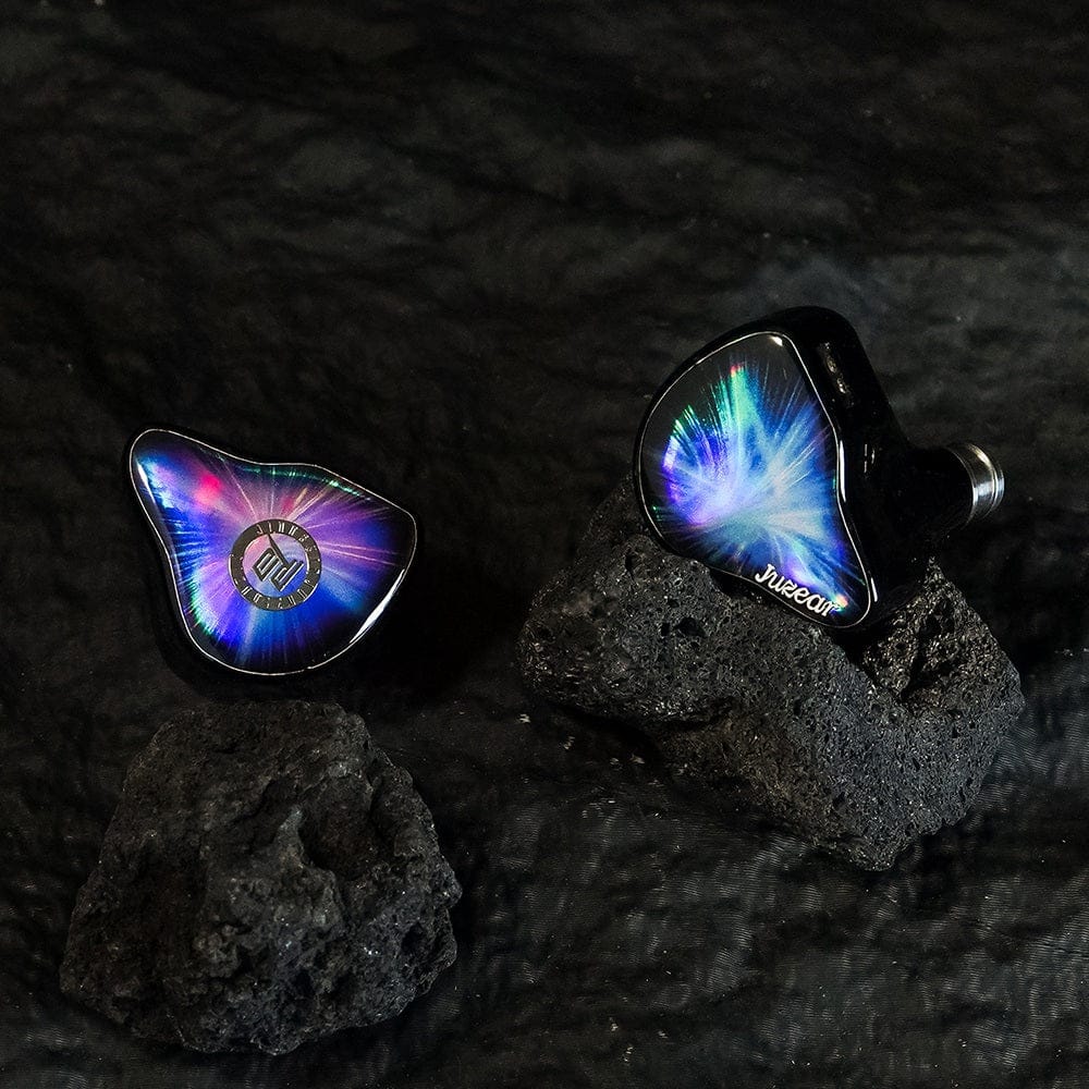 Juzear Nebula pair, faceplates forward, against a dark ground. Photo: Juzear Audio.