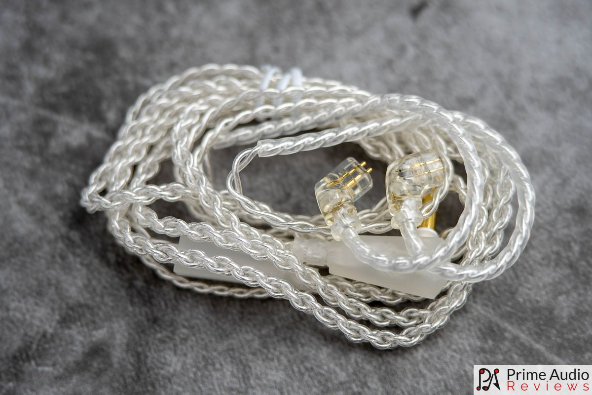 The included detachable silver-plated copper cable with transparent 2-pin connectors. Photo: Prime Audio Reviews.
