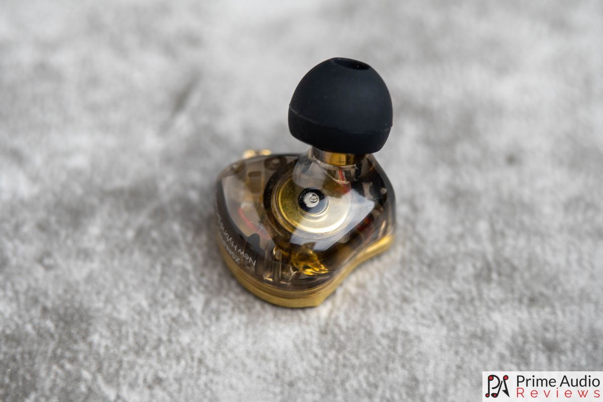The transparent shell showing the driver inside. Photo: Prime Audio Reviews.